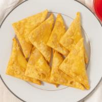 Crab Rangoon · 8 pieces filled with crabmeat and cream cheese.
