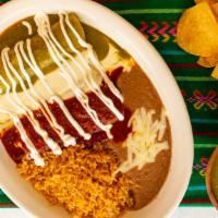 Enchiladas Mexicanas · Three chicken enchiladas topped with red sauce, lettuce, tomatoes, sour cream and guacamole....