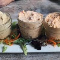 Dip Trio · Choice of three: buffalo chicken dip, spinach queso, pimento cheese, hummus served with flat...