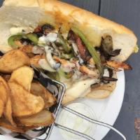 Philly Cheesesteak · Chicken or steak, peppers, onions, sauteed mushrooms, mayo, provolone.