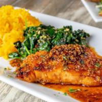 Honey Glazed Salmon  · New Menu Item! Salmon topped with garlic honey, served with Caswell rice and sauteed spinach