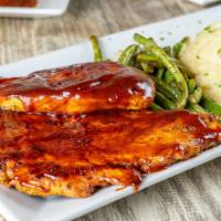 Bbq Grilled Chicken Breast · Two boneless chicken breast marinated in BBQ sauce with green beans and mashed potatoes.