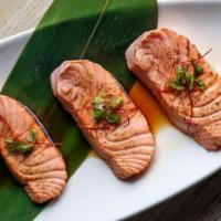 Aburi Salmon · Seared salmon with yuzu truffle ponzu.