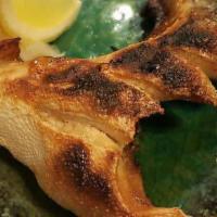 Hamachi Kama · Grilled jaw with salt and ponzu sauce.