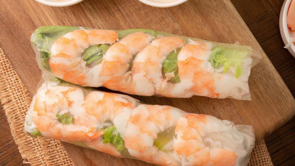 Fresh Shrimp Spring Rolls / Goi Cuon · 2 pieces. Spring rolls filled with shrimps, vermicelli, mixed fresh herbs, cucumber, and, dip in dipping sauce.