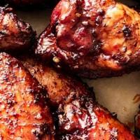 10 Jumbo Smoked Wings · Wood smoked then grilled or fried to order -smoked & Blackened or tossed with Bill's BBQ Sau...