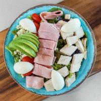Country Cobb Salad · Mixed greens, roast turkey, naturally smoked ham, tomato, hard-boiled egg, green onions, avo...