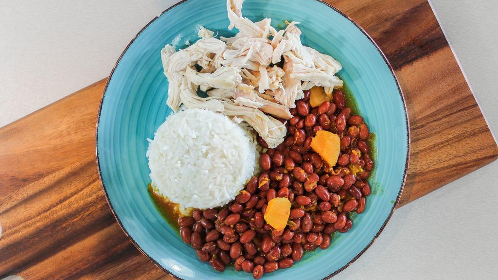 Little Rice Bowl · Bowl of white rice topped with pink beans and grilled chicken.