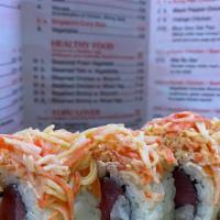 Volcano Roll · Tuna and cream cheese inside, spicy crabmeat on the top.