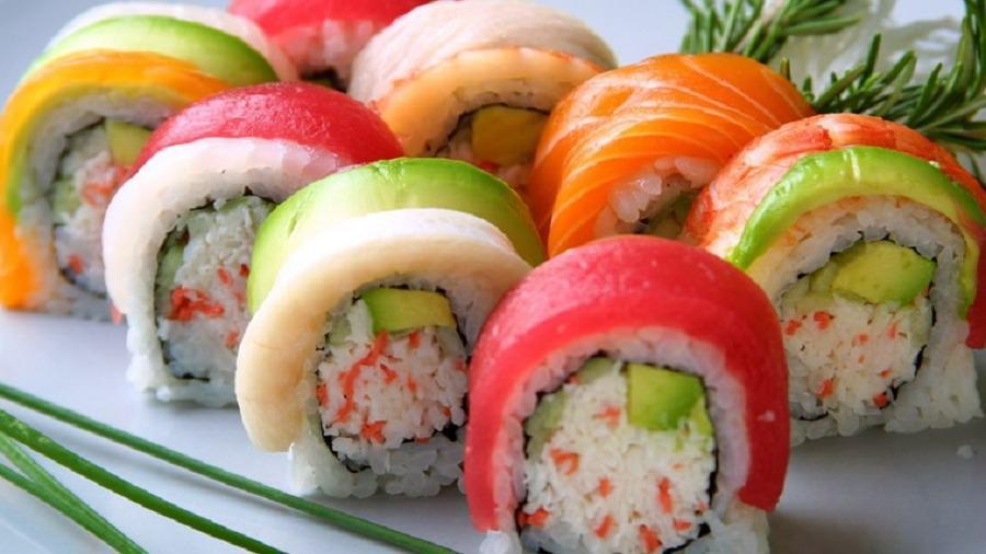 Rainbow Roll · California rolls inside with different fish on the top.