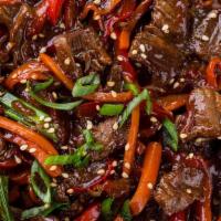 Mongolian Beef(L)蒙古牛 · Hot and spicy. Served with plain fried rice or white steamed rice.
