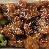 Sesame Chicken(L)芝麻鸡 · Tender crispy  chicken, over with sweetish sauce. Served with plain fried rice or white stea...