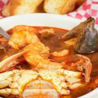 Caldo 7 Mares ( 7 Seas Seafood Soup) · Mix seafood soup includes shrimp, fish, blue crab, scallops, oysters, and octopus served wit...
