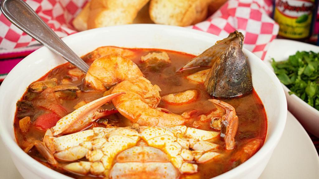 Caldo 7 Mares ( 7 Seas Seafood Soup) · Mix seafood soup includes shrimp, fish, blue crab, scallops, oysters, and octopus served with bread or tortillas of your choosing.
