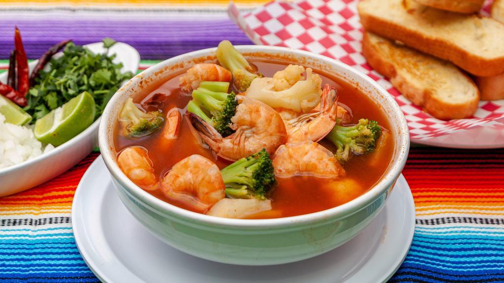 Caldo De Camaron · Shrimp soup mixed with cauliflower, broccoli and carrots served with a side of bread or warm tortillas.