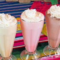Milkshakes · Available in Chocolate, Vanilla, and Strawberry