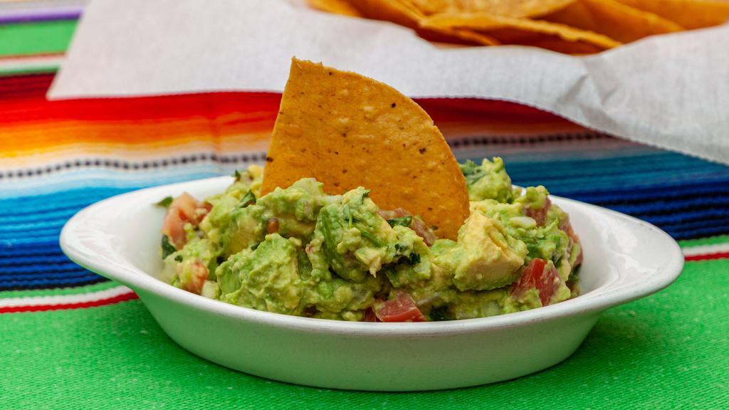 Guacamole · Made Fresh every day with guacamole, onions, tomatoes, and limes and cilantro