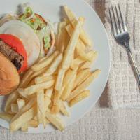 Steak Sandwich & Fries · Grilled Ribeye Steak with lettuce tomato onion on a toasted bun with French Fries.