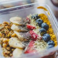 Baby Blue Bowl · Blueberry, coconut meat, almond milk, raw honey, avocado, golden flax. Topped with: strawber...