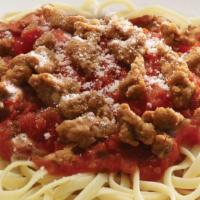 Pasta Diablo · Spicy Italian sausage and your favorite pasta in marinara and finished with Peconiro Romano ...