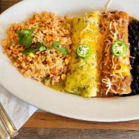 Enchiladas Mexicanas · Two cheese enchiladas topped with beef tips, cooked with tomatoes, onions, bell peppers, and...
