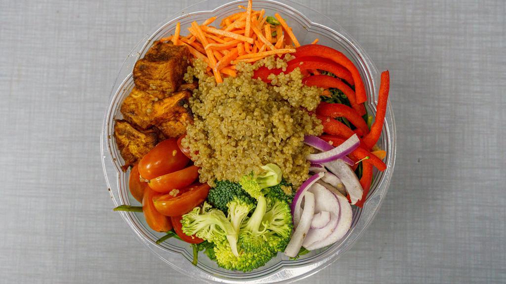 Harriets Promise Bowl · In honor of Harriet Tubman we created a delicious bowl. It's filled with kale, spinach, quinoa, roasted sweet potatoes, carrots, red onion, broccoli and tomato.