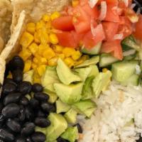Gloria Estefan'S Taco Bowl · A taco bowl filled with white rice, pico de gallo, black beans, corn, avocado and chips.
