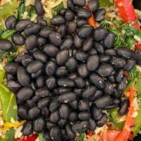 Thelma'S Grain Bowl · A savory bowl filled with white rice, quinoa, bell peppers, onions and black beans.