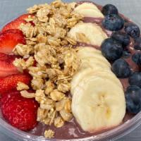 Acai Berry Bowl · mixed frozen acai, strawberries, bananas in almond milk topped with granola, fresh strawberr...