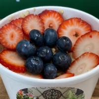 Oatmeal Topped With Strawberry / Blue Berry  · Old fashion oats cooked in almond milk mixed with cinnamon and brown sugar topped with straw...