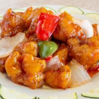 Ta-Chin Chicken · Chicken breast sautéed with onions, bell pepper, baby corn in a hot spicy sauce.