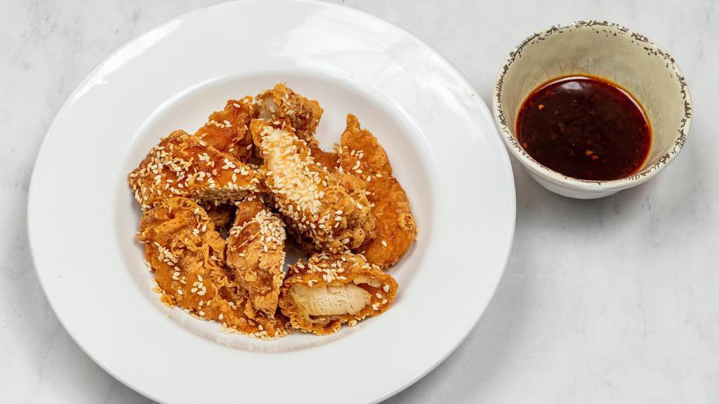 Sesame Chicken · Spicy. Whole chicken breast battered and fried with special hot sauce. Seasoned with sesame seeds on top.