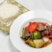 Pepper Steak · Sliced tenderloin beef cooked with onions and green peppers then sautéed with wine.