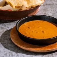 Skillet Queso · Favorite. Your chip’s favorite dip for over 25 years. Original with beef. Served with chips ...
