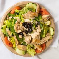 Greek Salad · Romaine, tomatoes, cucumber, green pepper, feta cheese and black olives. Served with homemad...
