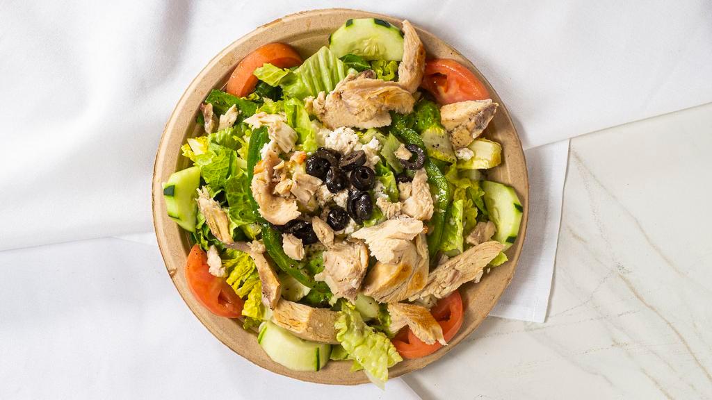 Greek Salad · Romaine, tomatoes, cucumber, green pepper, feta cheese and black olives. Served with homemade vinaigrette dressing and pita.