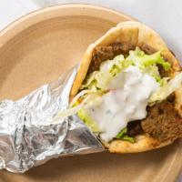Gyros · Pita bread topped with your choice of meat, lettuce, tomatoes and tzatziki.