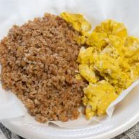 Kinche · Cooked cracked wheat season with Ethiopian spiced butter. Sided with scrambled egg. [olive o...