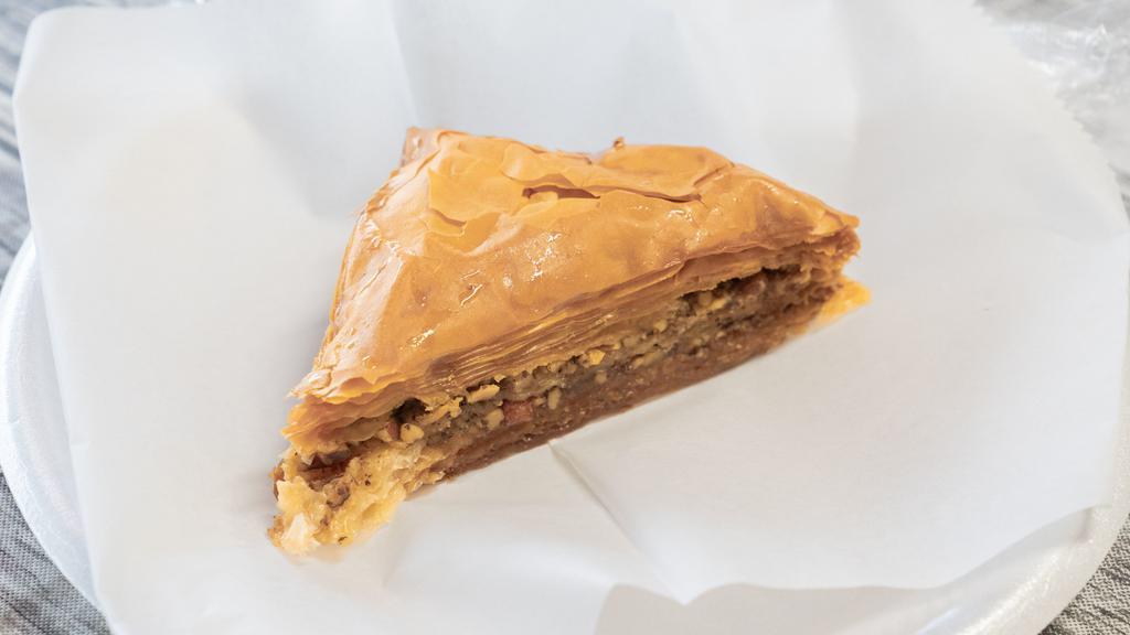 Baklava · Sweet vegetarian. Layers of phyllo dough and mixed nuts marinated in honey syrup