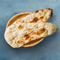 Butter Delight  Naan · House made pulled and leavened dough baked to perfection in an Indian clay oven  and smother...