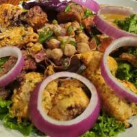 Mixed Grill · Chicken tikka, boti kabab & tandoori shrimp.