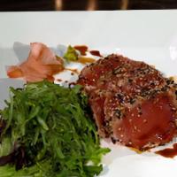 Seared Black Pepper Tuna · Seaweed salad, and seared black pepper tuna with wasabi yuzu sauce.