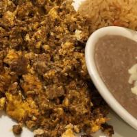 Huevos Con Chorizo · Three eggs. Served with rice, beans, and tortillas.
