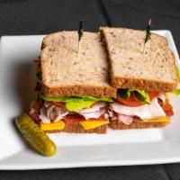 Club Sandwich · Turkey and ham with options of lettuce, tomato, mayo, mustard.