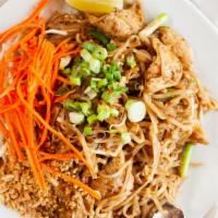 Pad Thai · Stir-fried rice noodles with egg, tofu, ground peanuts, bean sprouts, and green onion.