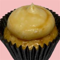Salted Caramel · Vanilla cake and vanilla frosting covered in caramel sauce.