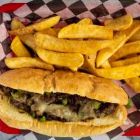Philly Beef Handheld · Onions, green peppers, mushrooms, cheese blend, lettuce, tomatoes, and mayo.