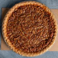 White Chocolate Pecan Pie · A classic Southern pie crafted-by-hand with fresh Texas pecans and white chocolate in a flak...