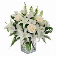 Remember Sympathy Flowers · Remember them with this contemporary cube vase of white and cream flowers. Our Flowers desig...