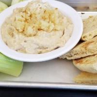 Hummus · Your choice of roasted red pepper, pesto, roasted garlic or cracked pepper hummus served wit...